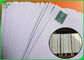 Roll Putih Woodfree Kertas Kustom Lebar 75GSM 570MM Untuk Membuat Buku Sekolah