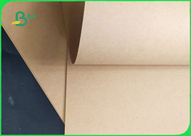 250 / 300 / 300gsm Permukaan Kekuatan Baik Glossy Kraft Paper Roll Untuk Pengemasan
